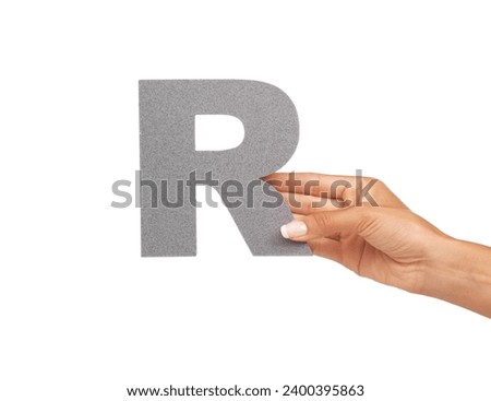 Woman, hand and letter R or alphabet in studio for advertising, learning and teaching presentation. Sign, font and character for abc, text or communication and grammar or symbol on white background