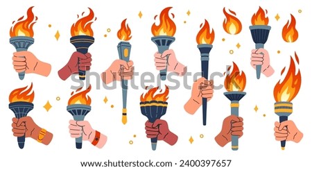 Torch in hand set. Vector isolated burning torches flames in hands. Symbols of relay race, competition victory, champion or winner. Royalty-Free Stock Photo #2400397657