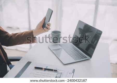 Audit concept,Administrator business man financial inspector and secretary making report calculating balance. Internal Revenue Service checking document.