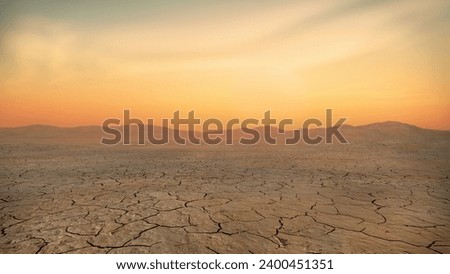 Cracked earth in hot desert during sunset - Background desert Royalty-Free Stock Photo #2400451351
