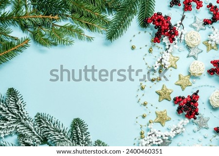 Christmas pattern on a light blue background with decoration ornaments elements. Concept of winter, christmas or new year. Flat lay