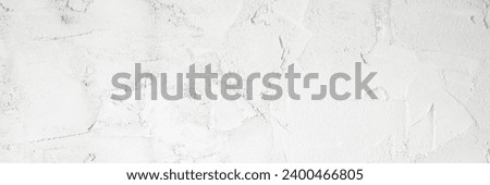 Light gray dry putty ceiling, wall or floor background. Closeup. Wide banner. Empty place for text.