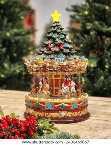 Music box shaped like Santa Claus and pine needles for Christmas celebrations