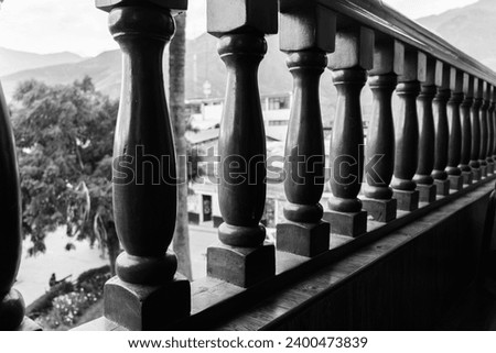Pattern of wooden railings. Photographic composition rhythm. Visual composition. Black and white Royalty-Free Stock Photo #2400473839