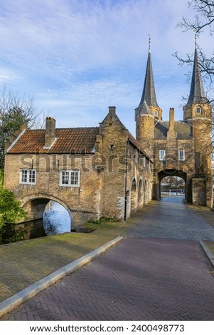 Iconic Delft Gothic city gate "Oostpoort" (Eastern Gate) from the 14th century. Delft, The Netherlands.