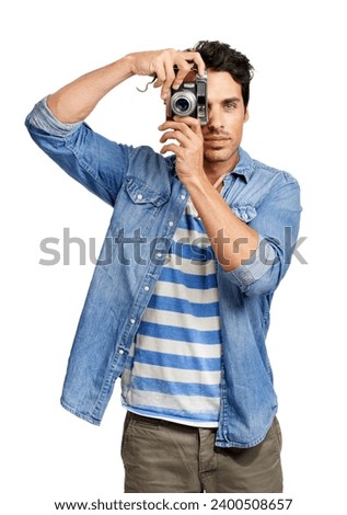 Photography, portrait and man with a camera in a studio for creative or art career with confidence. Casual, vintage dslr equipment and young male photographer from Canada isolated by white background