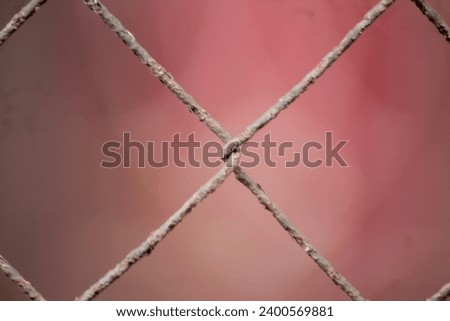 Closeup wire fence aginst blur background