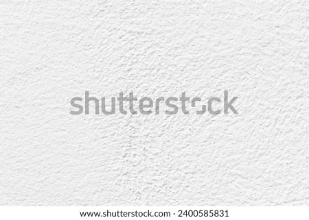 White concrete wall texture background. Uneven rough and grunge texture. Stucco cement wall background.