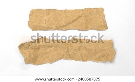 Recycled paper craft stick on a white background. Brown paper torn or ripped pieces of paper isolated on white background. Collection of Scotch tape isolated on a white background.