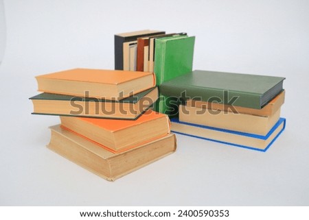 stack of books on white background, education concept