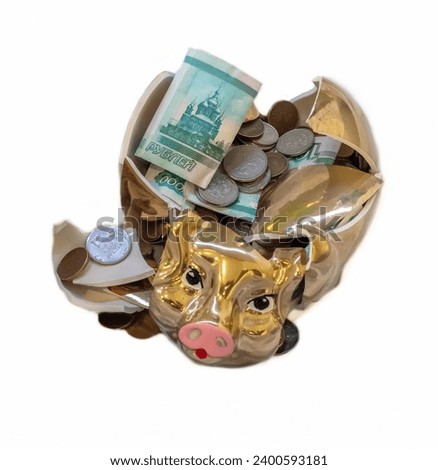 a broken piggy bank with rubles, in the form of a pig
