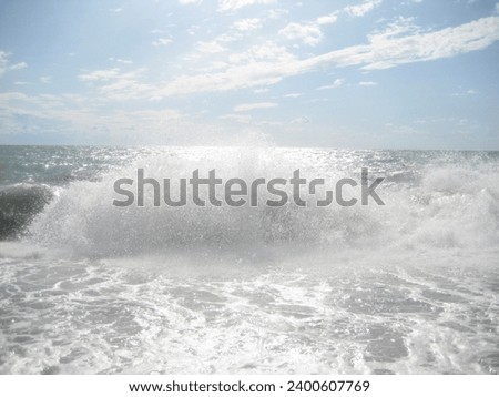 macro photo with a decorative natural background of white sea foam in sunlight for design as a source for prints, posters, decor, interiors, wallpaper, decoration, advertising