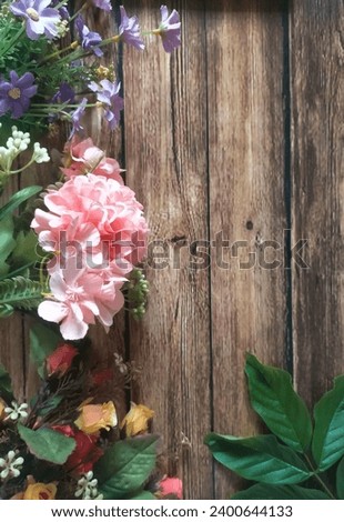 Some flowers on wood background 