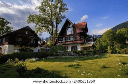 Traditional wooden house by the lake in summer Hallstatt, Austria
