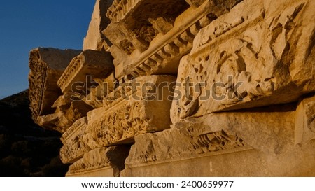 Knidos ancient city and port. Ruins of the ancient city of Knidos at sunset. Ancient buildings and sunset. Royalty-Free Stock Photo #2400659977