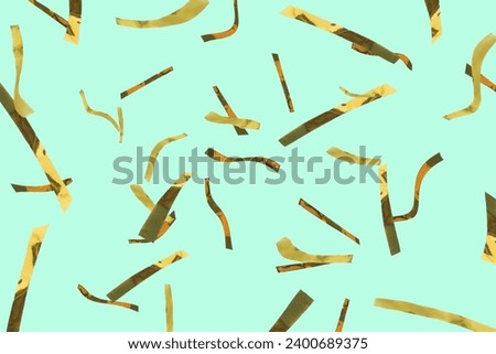 Shiny golden confetti falling on turquoise background