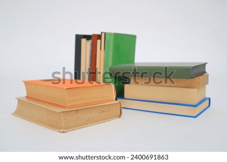 stack of books on white background, education concept