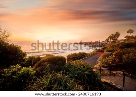 A view of Laguna Beach sunset at the beach. Laguna Beach is located in southern California. USA Royalty-Free Stock Photo #2400716193