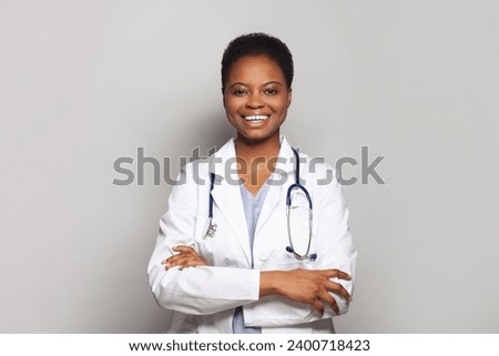 Confident female doctor medical worker on white background