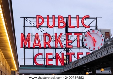 View of the public market sign in Seattle, WA. Royalty-Free Stock Photo #2400739553