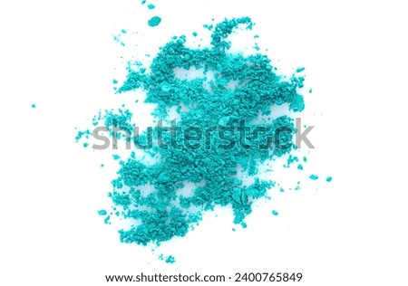 Pile of blue kinetic sand on white background