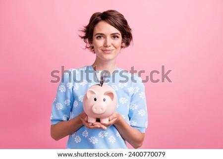 Photo of lovely positive person hands hold money bank pig dollar bills isolated on pink color background