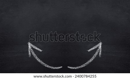 Two curved arrows on a slate board