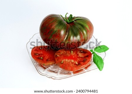 Heirloom Tomato variety, Pink Berkley Tie Dye Royalty-Free Stock Photo #2400794481