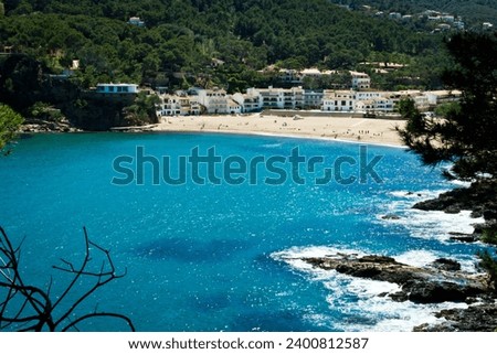 Beach on the Costa Brava of Spain, turquoise sea, blue sky