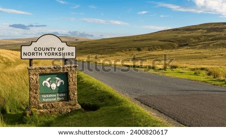 Sign: County of North Yorkshire and Yorkshire Dales National Park, seen on the B6270 road between Kirkby Stephen and Gunnerside, North Yorkshire, UK Royalty-Free Stock Photo #2400820617