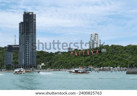 Thailand Pattaya city cityscape with letters  view from sea