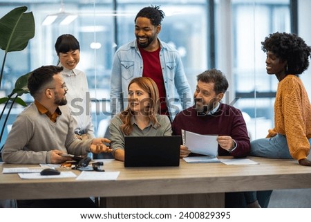 International workers group and team leader having teamwork discussion managing project at work in meeting room. Royalty-Free Stock Photo #2400829395
