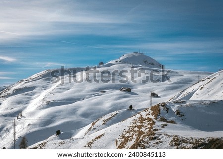 
Snow-capped mountain with white blanket of snow on high altitude ski slopes in the Italian Dolomites