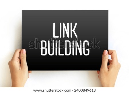 Link building - practice of building one-way hyperlinks to a website with the goal of improving search engine visibility, text concept on card Royalty-Free Stock Photo #2400849613