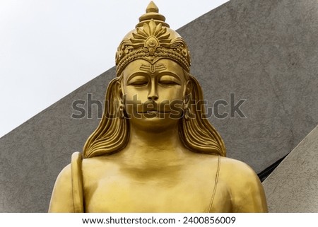 hindu god lord hanumana in meditation isolated statue with bright background at morning image is taken at The Statue of Belief or Vishwas Swaroopam nathdwara rajasthan india.