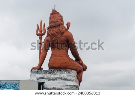 back view of hindu god lord shiva isolated statue with bright background at morning image is taken at statue of belief nathdwara rajasthan india.