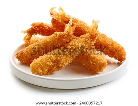 plate of breaded Torpedo shrimps isolated on white background Royalty-Free Stock Photo #2400857217