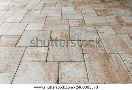 Pool area tiles and tiling around the back patio, new home construction in South Florida. Royalty-Free Stock Photo #2400885573