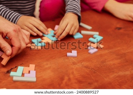 logical multi-colored toys on the table background