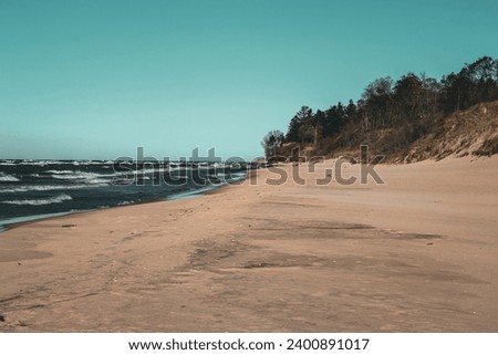 Lake Michigan from the beach at Duck Lake State Park MI Royalty-Free Stock Photo #2400891017