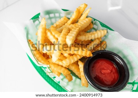 Fresh French Fries in Green Basket