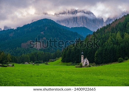 San Giovanni in Ranui Church, a Dolomitic treasure on Ranui Hof, enchants amidst meadows, a timeless South Tyrolean icon, beautifully captured in every photograp