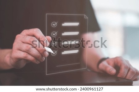 Document management system DMS. man using pen and digital tablet working  on virtual screen checklist and clipboard task management filling survey form online