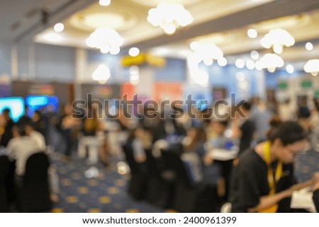 Royalty high quality free stock photo of abstract blur and defocused unidentified peoples are attending a AI artificial intelligence technology event