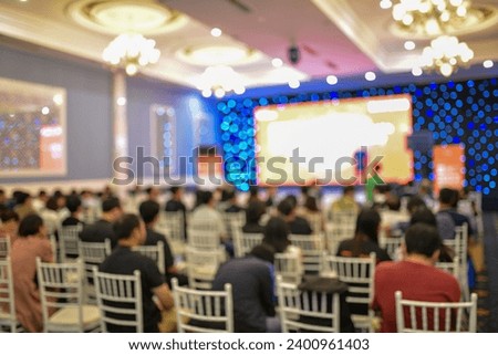 Royalty high quality free stock photo of abstract blur and defocused unidentified peoples are attending a AI artificial intelligence technology event