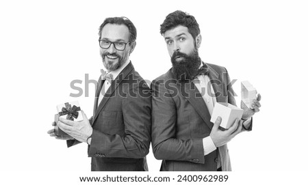 Online shop. success and reward. esthete. business partners on meeting isolated on white. bearded men hold valentines gift. happy birthday shopping. businessmen in suit on party. Shopping online