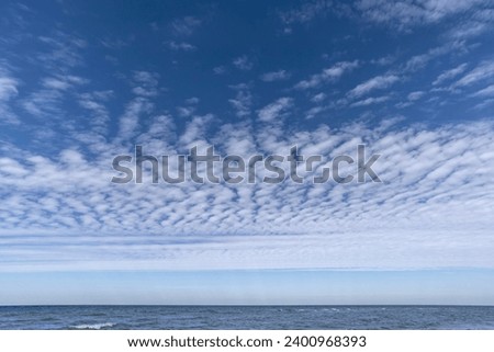 Large Sheep Clouds (Altocumulus) over the Baltic Sea, Germany Royalty-Free Stock Photo #2400968393
