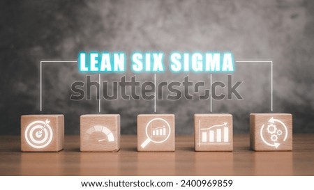 Lean Six Sigma concept, Wooden block on wooden desk with  lean six sigma icon on virtual screen, define, measure, analyze, improve, and control. Royalty-Free Stock Photo #2400969859