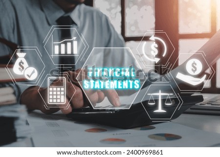 Financial statements concept, Businessman using calculator and analyzing income charts and graphs on office desk with financial statements icon on virtual screen.