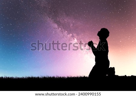 Silhouette of a lonely and hopeless person, unemployed, heartbroken, abandoned by God. Royalty-Free Stock Photo #2400990155